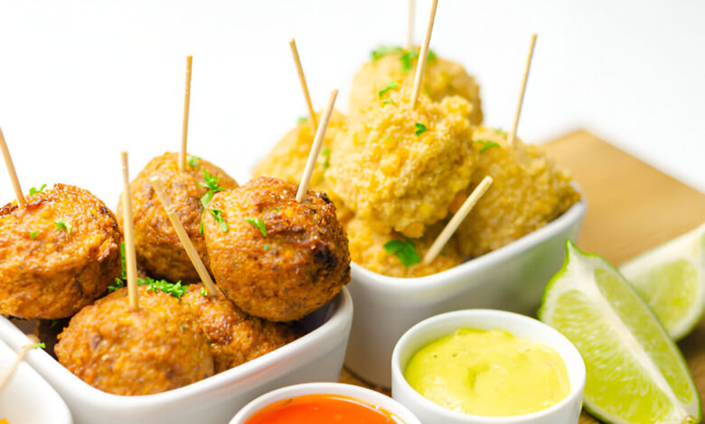 Assorted mini chicken kievs and sweet potato falafels served with saucesssorted mini chicken kievs and sweet potato falafels served with sauces