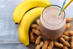 Fresh-bananas-peanut-butter-yogurt-and-honey-on-a-wooden-table